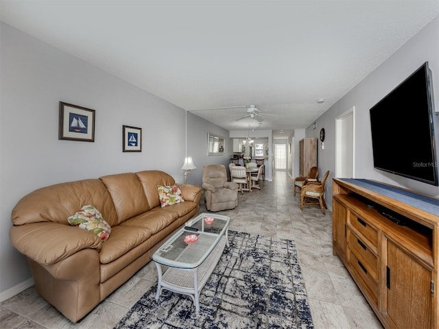 418 Cerromar Ct Unit 158, Venice, FL 34293 - living room featuring a ceiling fan and baseboards