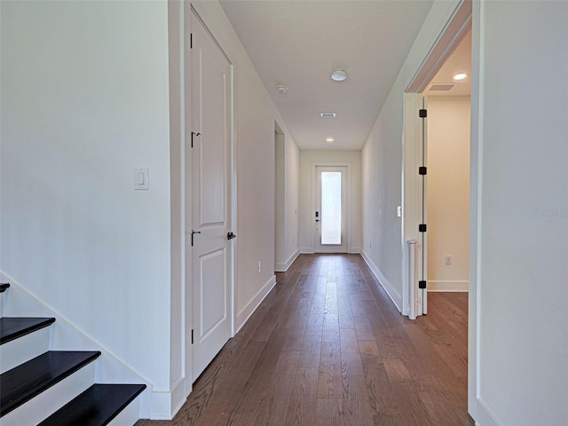 12705 Pinnacle Ln, Venice, FL 34293 - corridor featuring dark wood finished floors, baseboards, stairs, and recessed lighting