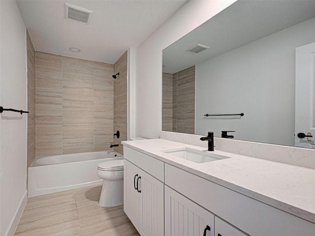 12705 Pinnacle Ln, Venice, FL 34293 - full bath featuring toilet, vanity, shower / bathtub combination, and baseboards