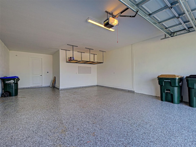12705 Pinnacle Ln, Venice, FL 34293 - garage featuring a garage door opener
