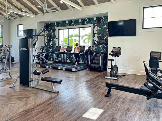 12705 Pinnacle Ln, Venice, FL 34293 - exercise room with beam ceiling and baseboards