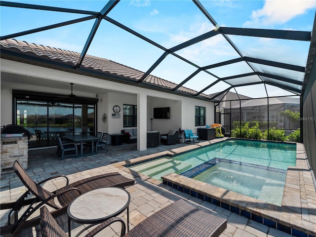 13056 Steinhatchee Loop, Venice, FL 34293 - view of pool with outdoor lounge area, a patio, a pool with connected hot tub, ceiling fan, and a lanai
