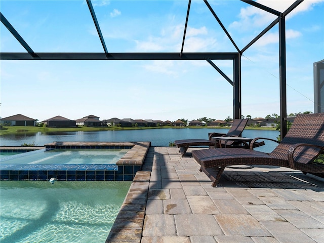 13056 Steinhatchee Loop, Venice, FL 34293 - view of swimming pool with a lanai, a water view, a patio, and a pool with connected hot tub