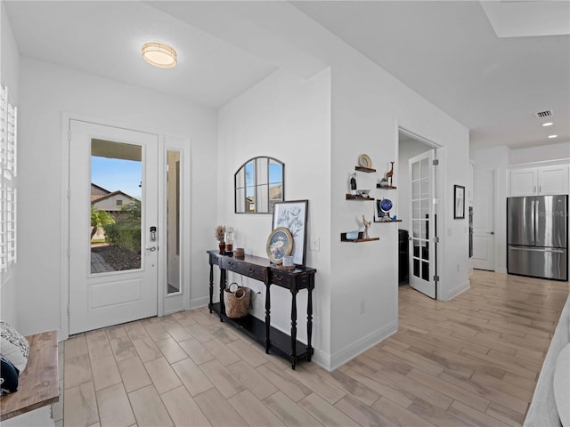 13056 Steinhatchee Loop, Venice, FL 34293 - foyer featuring light wood-style flooring, baseboards, and recessed lighting