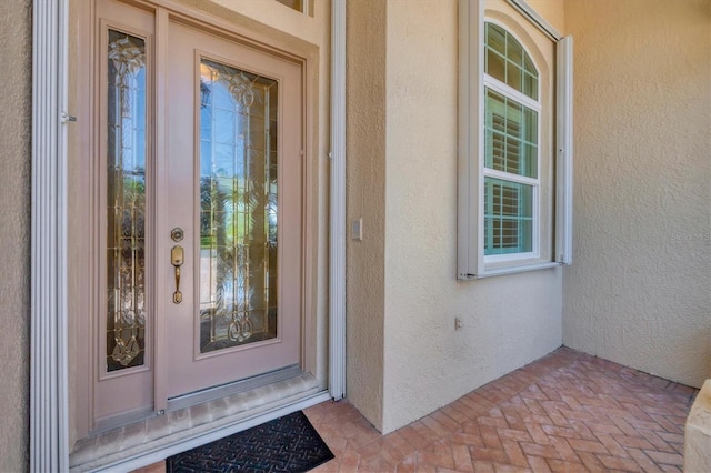 5018 Bella Terra Dr, Venice, FL 34293 - property entrance featuring stucco siding