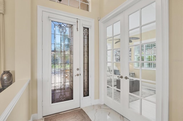 5018 Bella Terra Dr, Venice, FL 34293 - entryway with french doors and marble look tiles