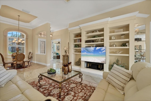 5018 Bella Terra Dr, Venice, FL 34293 - living area with a chandelier, built in features, crown molding, and marble finish floors