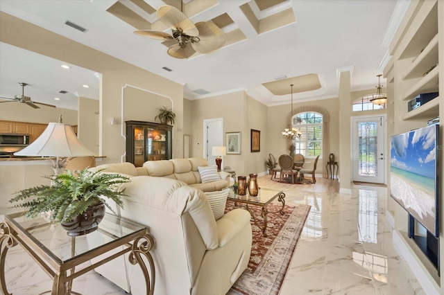 5018 Bella Terra Dr, Venice, FL 34293 - living area featuring ceiling fan, light marble finish flooring, ornamental molding, recessed lighting, and a chandelier