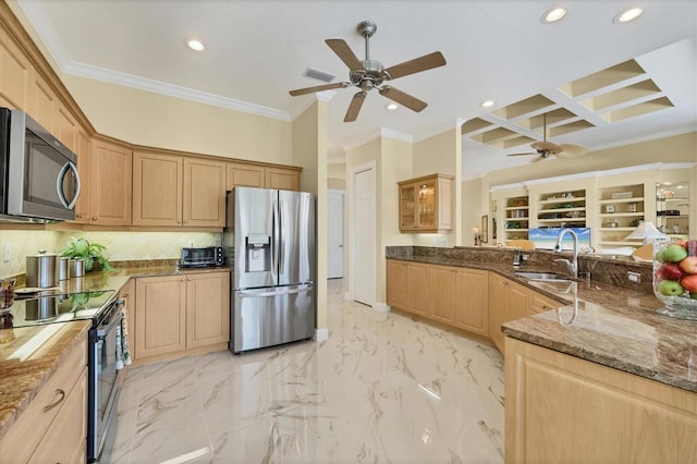5018 Bella Terra Dr, Venice, FL 34293 - kitchen with stainless steel appliances, a ceiling fan, crown molding, decorative backsplash, and dark stone countertops