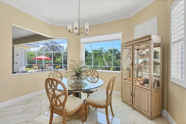 5018 Bella Terra Dr, Venice, FL 34293 - dining area featuring light marble finish floors, a chandelier, healthy amount of natural light, and ornamental molding