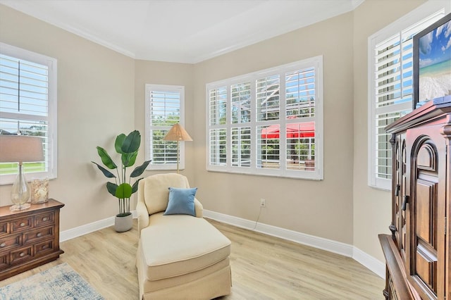 5018 Bella Terra Dr, Venice, FL 34293 - sitting room featuring wood finished floors and ornamental molding