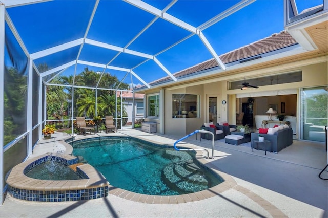 5018 Bella Terra Dr, Venice, FL 34293 - view of swimming pool featuring a patio area, a pool with connected hot tub, glass enclosure, and a ceiling fan