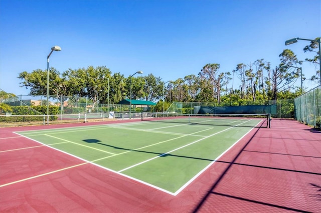 5018 Bella Terra Dr, Venice, FL 34293 - view of tennis court featuring community basketball court