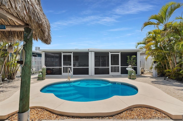 8 Sadowski Cswy, Key Colony Beach, FL 33051 - view of swimming pool with a sunroom and a patio area