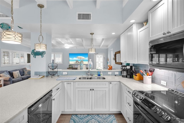 8 Sadowski Cswy, Key Colony Beach, FL 33051 - kitchen featuring stainless steel microwave, electric range, a sink, dishwasher, and beam ceiling