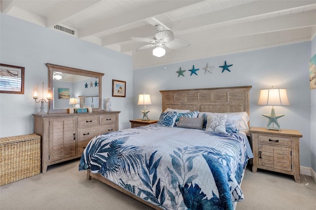 8 Sadowski Cswy, Key Colony Beach, FL 33051 - bedroom with light colored carpet, beam ceiling, and a ceiling fan