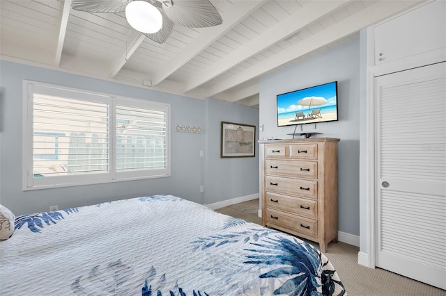 8 Sadowski Cswy, Key Colony Beach, FL 33051 - bedroom featuring beam ceiling, light colored carpet, and baseboards