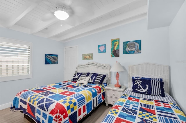 8 Sadowski Cswy, Key Colony Beach, FL 33051 - bedroom with wood finished floors, a ceiling fan, and wooden ceiling with exposed beams