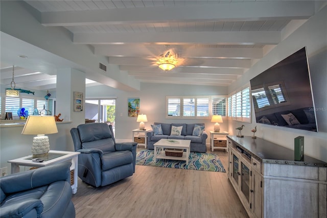 8 Sadowski Cswy, Key Colony Beach, FL 33051 - living area with wood finished floors and beamed ceiling