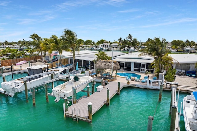 8 Sadowski Cswy, Key Colony Beach, FL 33051 - dock featuring a patio area, a water view, and an outdoor pool