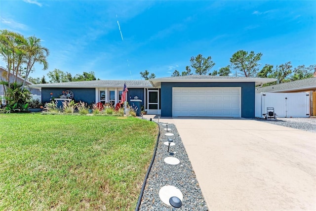 5207 5th Avenue Dr NW, Bradenton, FL 34209 - ranch-style house featuring stucco siding, concrete driveway, and an attached garage