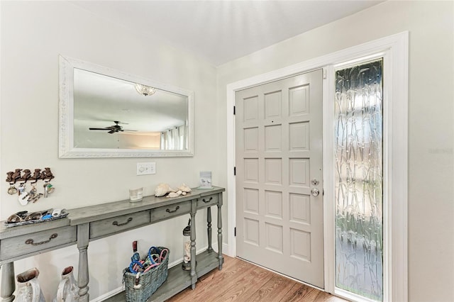 5207 5th Avenue Dr NW, Bradenton, FL 34209 - entryway with light wood-style floors and ceiling fan