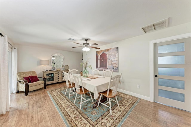 5207 5th Avenue Dr NW, Bradenton, FL 34209 - dining area with plenty of natural light, light wood-type flooring, and ceiling fan