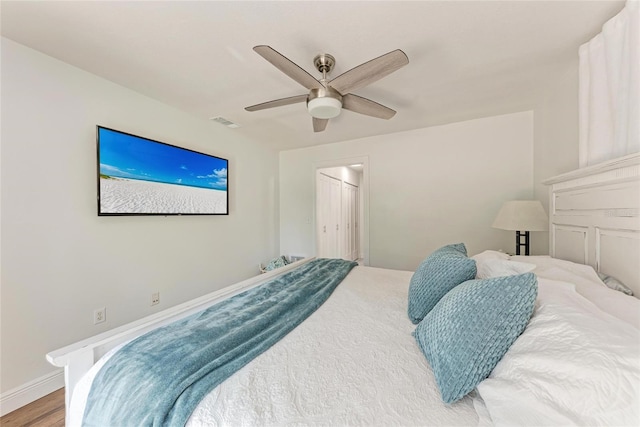 5207 5th Avenue Dr NW, Bradenton, FL 34209 - bedroom featuring wood finished floors, a ceiling fan, baseboards, and a closet