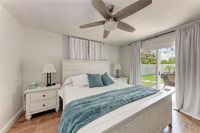 5207 5th Avenue Dr NW, Bradenton, FL 34209 - bedroom with access to exterior, light wood-style floors, baseboards, and ceiling fan