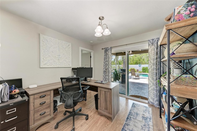 5207 5th Avenue Dr NW, Bradenton, FL 34209 - office area with light wood-type flooring and a chandelier