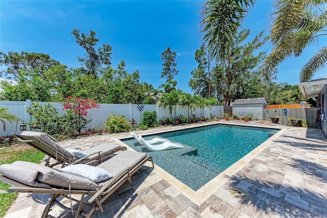 5207 5th Avenue Dr NW, Bradenton, FL 34209 - view of pool featuring a hot tub, a patio, and a fenced backyard