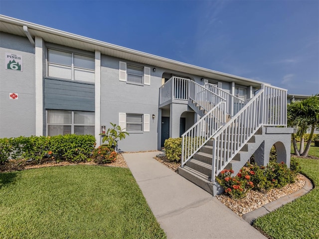 25050 Sandhill Blvd Unit 6A3, Punta Gorda, FL 33983 - view of building exterior featuring stairs