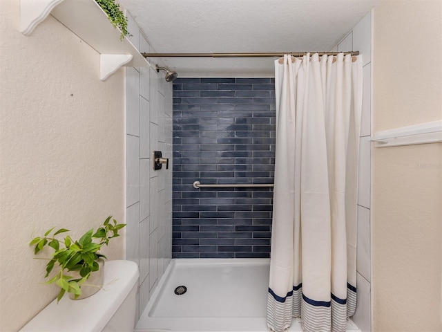 25050 Sandhill Blvd Unit 6A3, Punta Gorda, FL 33983 - full bath with a tile shower, a textured wall, and a textured ceiling
