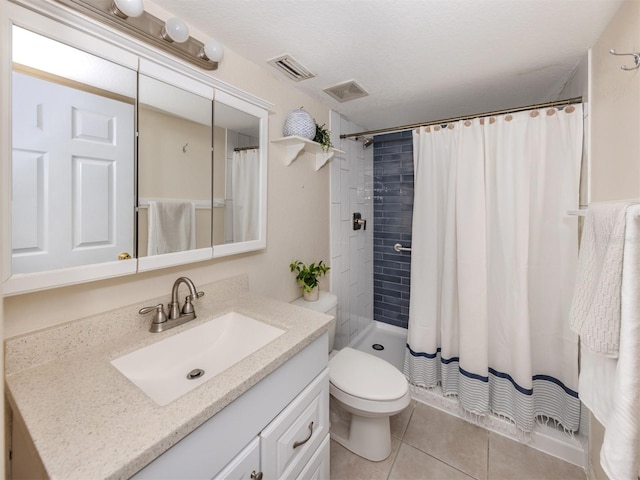 25050 Sandhill Blvd Unit 6A3, Punta Gorda, FL 33983 - bathroom with vanity, tile patterned flooring, toilet, and a shower with curtain