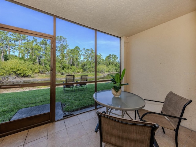 25050 Sandhill Blvd Unit 6A3, Punta Gorda, FL 33983 - sunroom featuring healthy amount of natural light