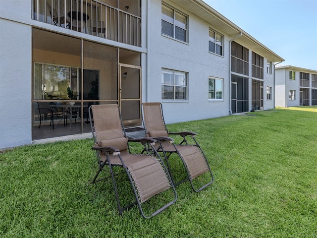 25050 Sandhill Blvd Unit 6A3, Punta Gorda, FL 33983 - view of grassy yard featuring a balcony
