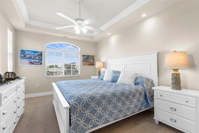 235 Base Ave E Unit 207, Venice, FL 34285 - carpeted bedroom featuring a raised ceiling, recessed lighting, crown molding, and a ceiling fan