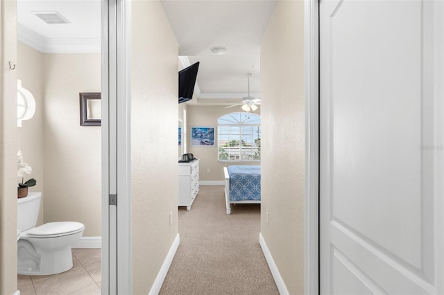 235 Base Ave E Unit 207, Venice, FL 34285 - hall featuring crown molding and light carpet