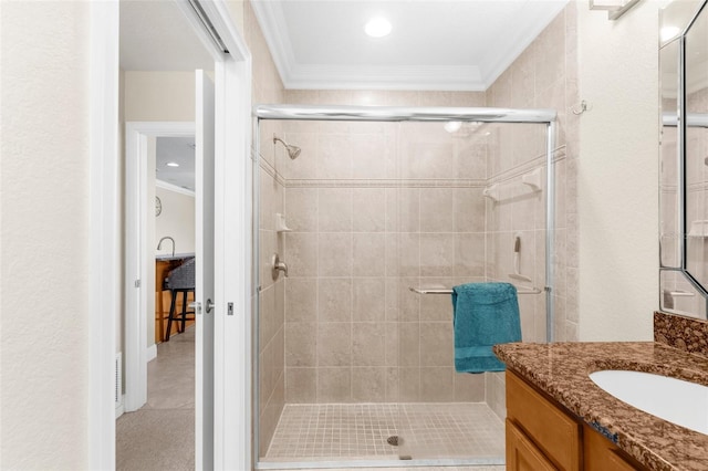 235 Base Ave E Unit 207, Venice, FL 34285 - full bathroom with ornamental molding, vanity, and a stall shower