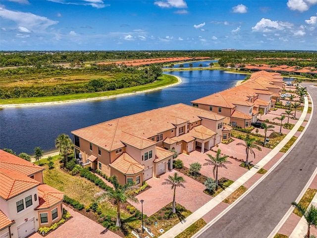 10213 Staggerbush Dr Unit 202, Venice, FL 34293 - aerial perspective of suburban area with a nearby body of water and a notable bridge