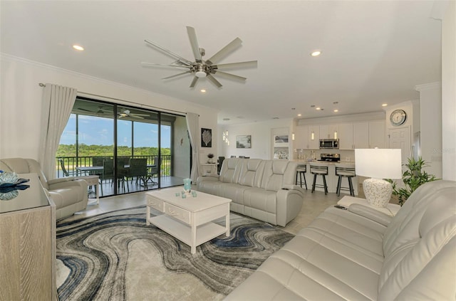 10213 Staggerbush Dr Unit 202, Venice, FL 34293 - living room with ceiling fan, ornamental molding, and recessed lighting