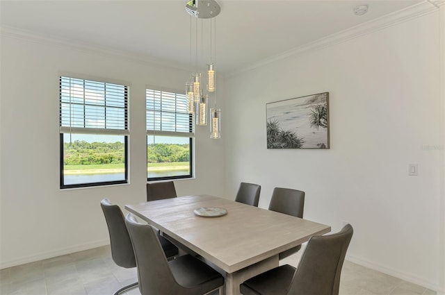 10213 Staggerbush Dr Unit 202, Venice, FL 34293 - dining space with ornamental molding, baseboards, and light tile patterned flooring