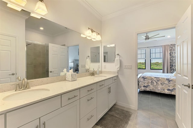 10213 Staggerbush Dr Unit 202, Venice, FL 34293 - full bath with ensuite bath, double vanity, tile patterned floors, ornamental molding, and a shower stall