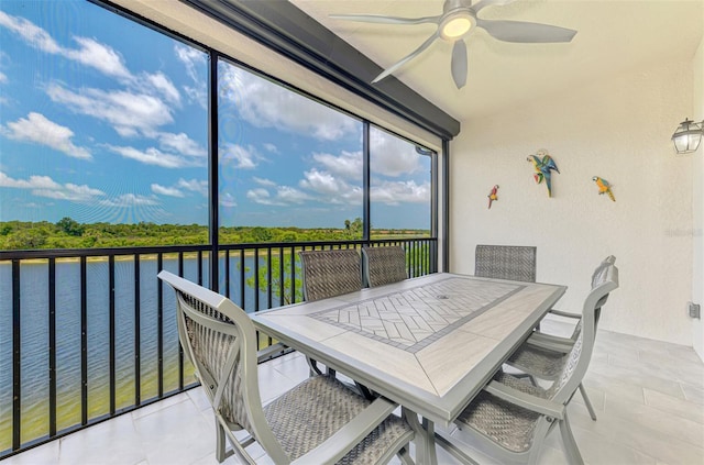 10213 Staggerbush Dr Unit 202, Venice, FL 34293 - sunroom / solarium featuring a water view