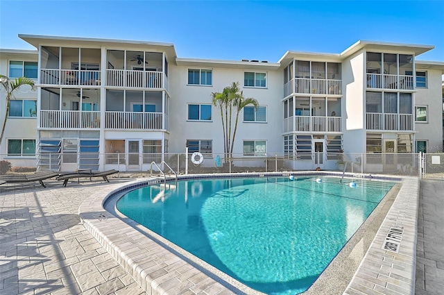 708 Tamiami Trl S Unit 115, Venice, FL 34285 - community pool featuring a ceiling fan