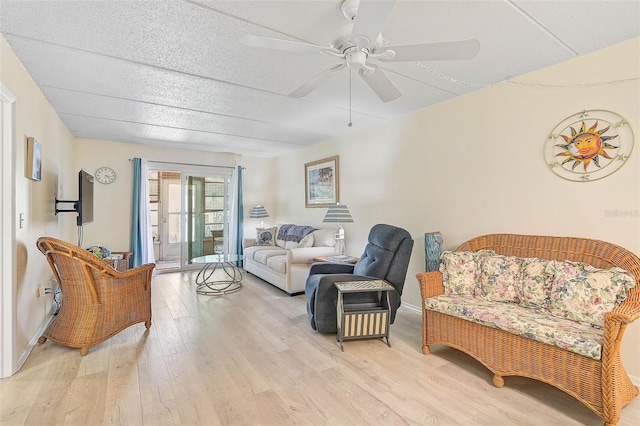 708 Tamiami Trl S Unit 115, Venice, FL 34285 - living room featuring light wood finished floors and a ceiling fan