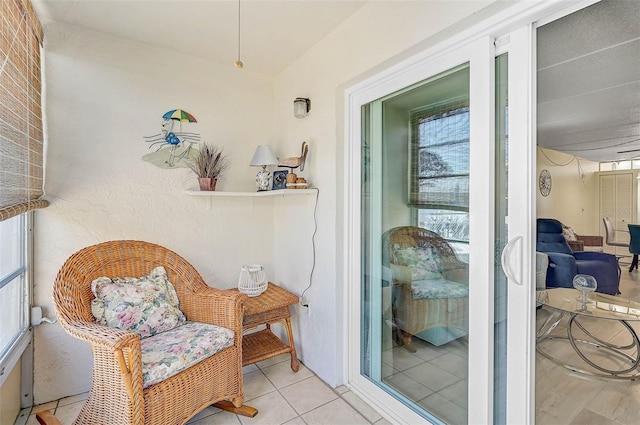 708 Tamiami Trl S Unit 115, Venice, FL 34285 - sitting room featuring tile patterned flooring