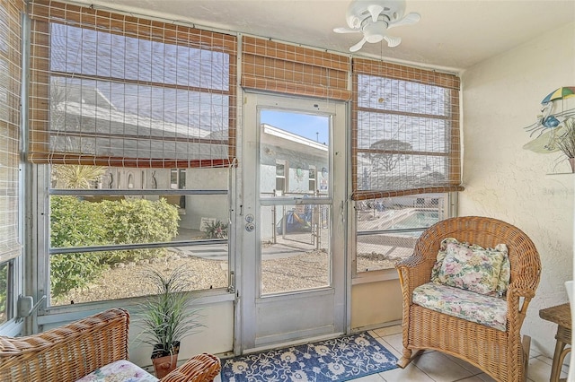 708 Tamiami Trl S Unit 115, Venice, FL 34285 - sunroom with ceiling fan