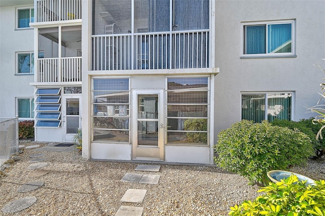 708 Tamiami Trl S Unit 115, Venice, FL 34285 - doorway to property featuring stucco siding