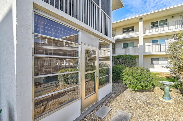 708 Tamiami Trl S Unit 115, Venice, FL 34285 - property entrance featuring stucco siding